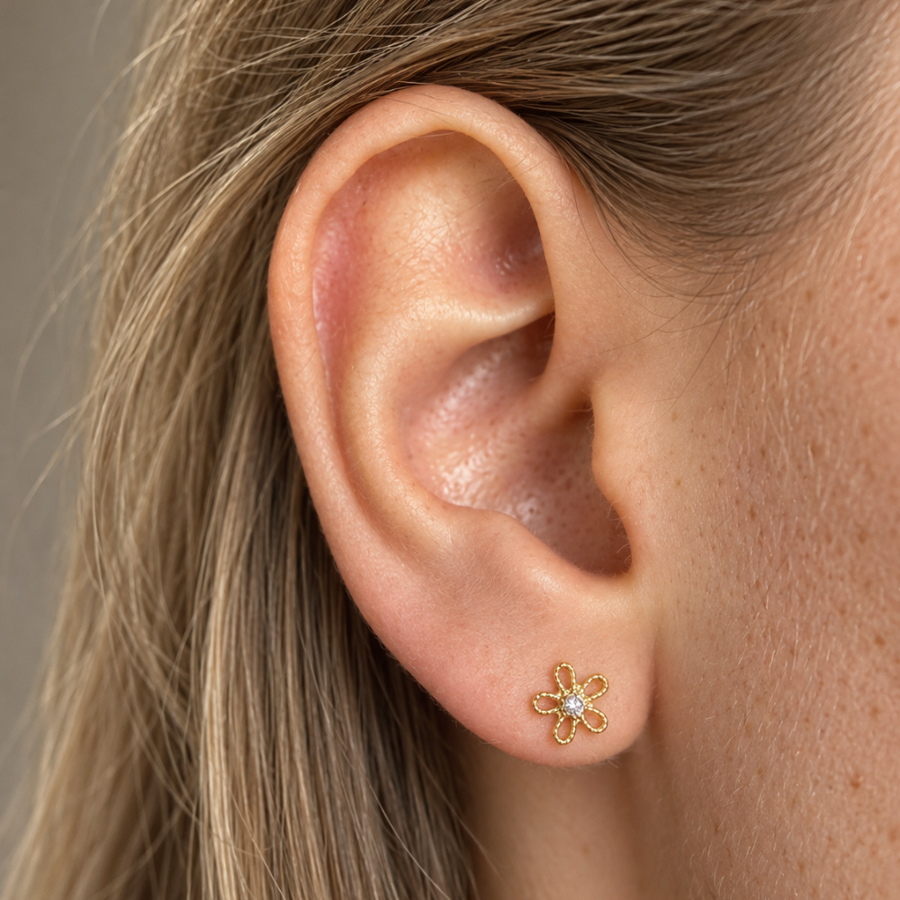 Titan-Labret, dekorative azurblaue Blume mit Zirkonia am Ohr