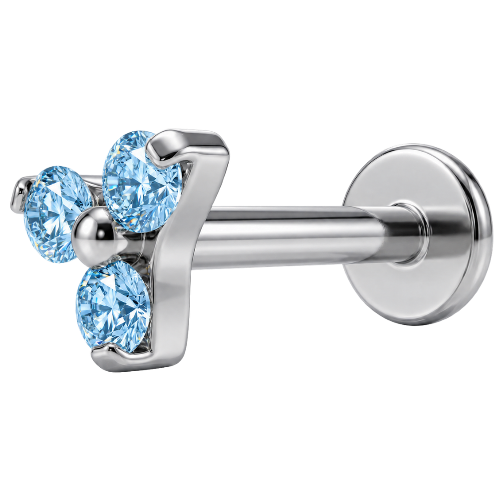 Titan-Labret, dekorativ, drei blaue Zirkone